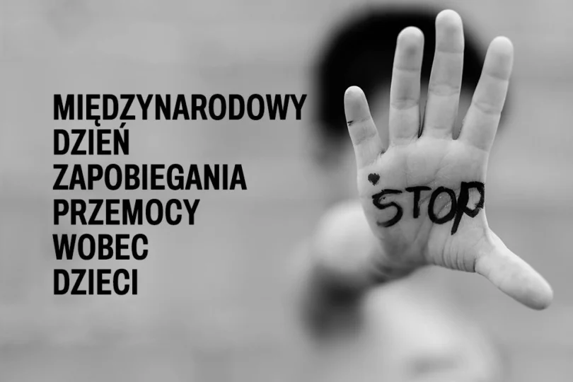 na szarym tle napis: Międzynarodowey Dzień Przeciwdziałania Przemocy wobec dzieci oraz dziecięca dłoń z napisem stop