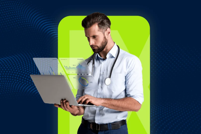 Grafika przedstawia mężczyznę trzymającego laptop